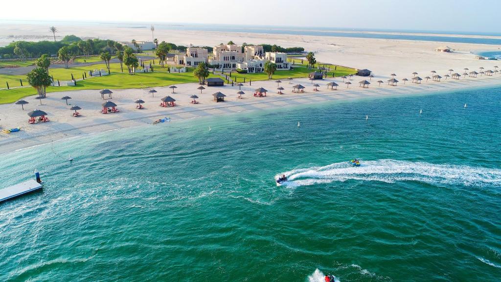 Al Maya Island & Resort pool and beach